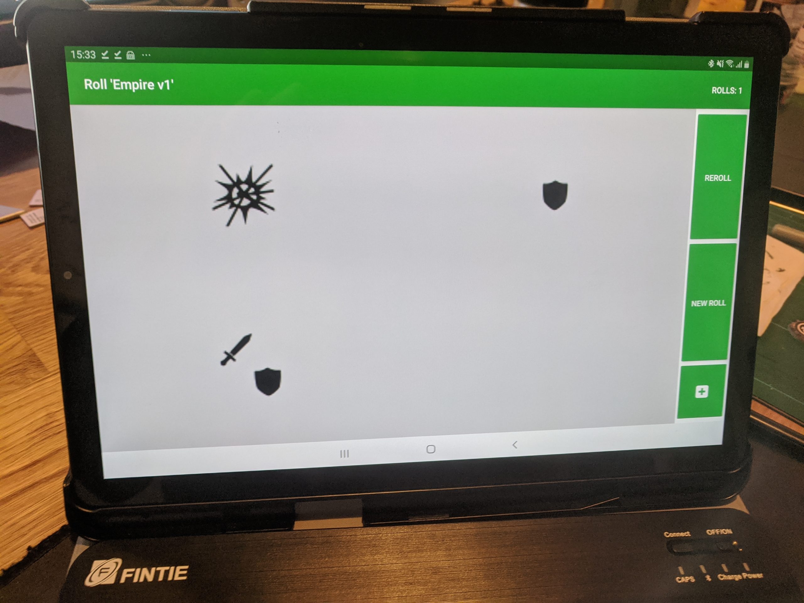 Photo of the 'custom image dice' app running on a tablet